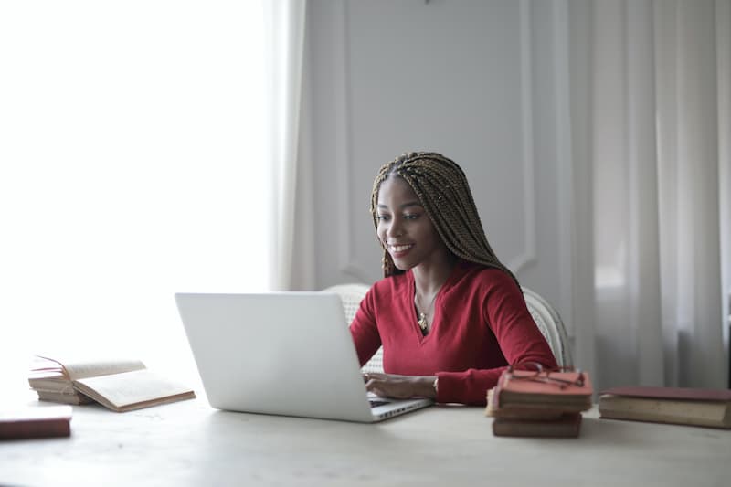 Woman sitting at laptop