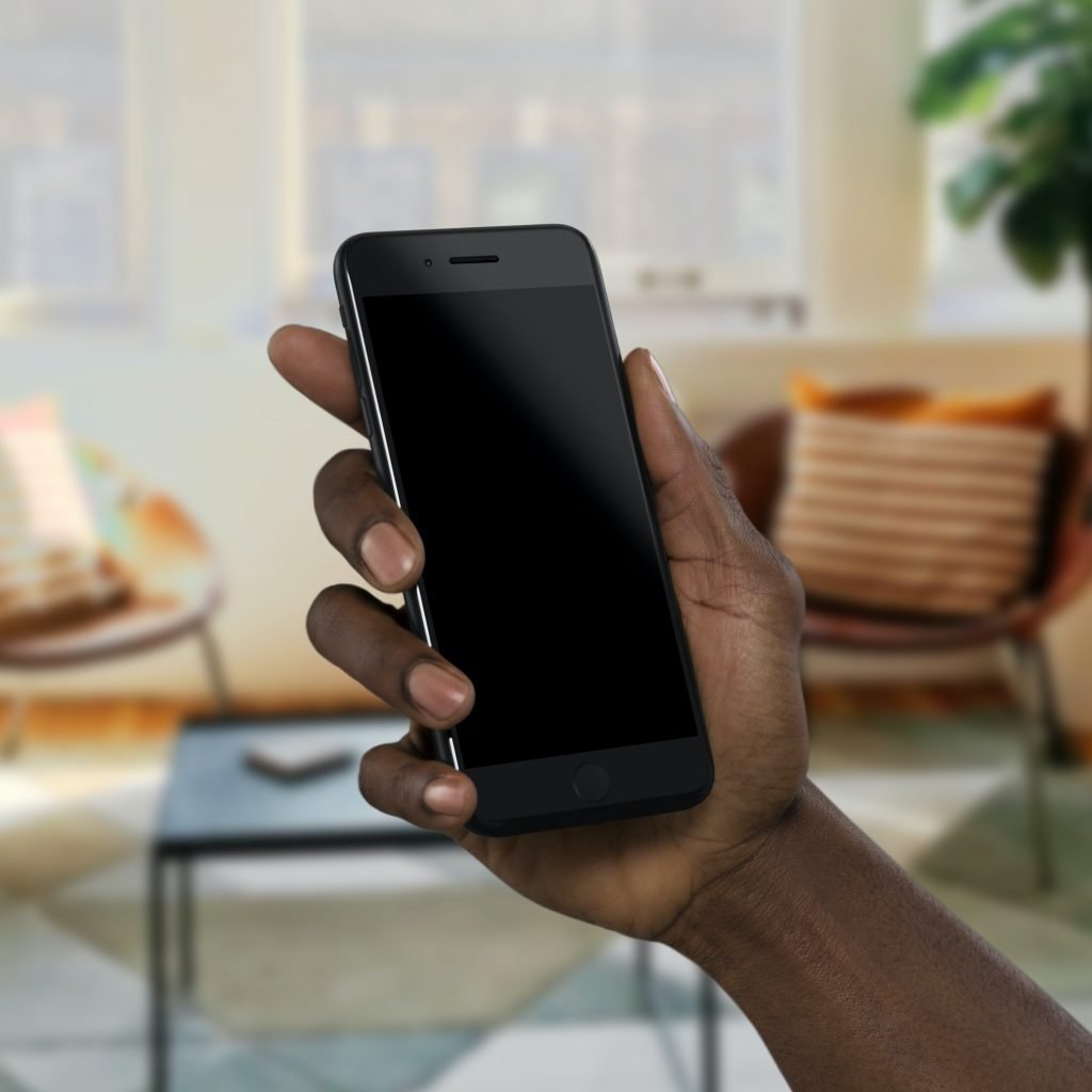 Woman holding phone.