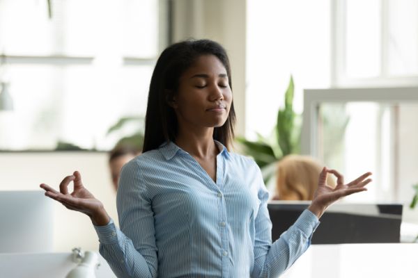Women finding peace in meditation